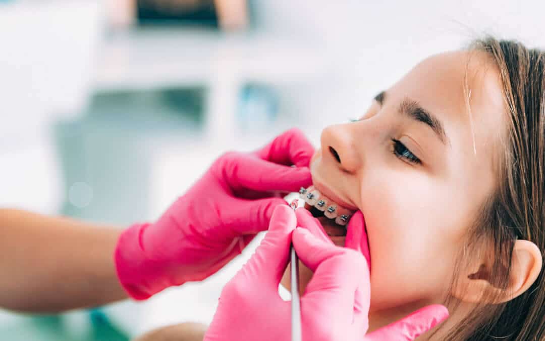 kid with braces